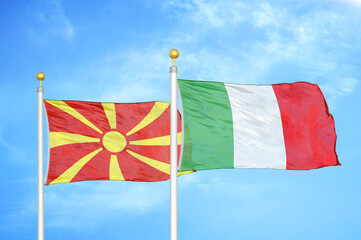 North Macedonia and Italy two flags on flagpoles and blue sky