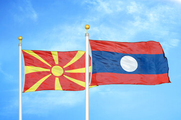 North Macedonia and Laos two flags on flagpoles and blue sky