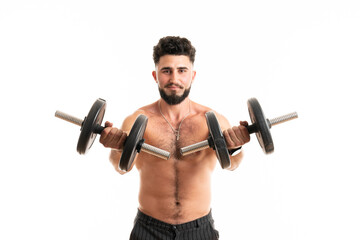 Fototapeta na wymiar Handsome power man fitness-model with six packs is training with dumbbells, isolated on white background with copyspace