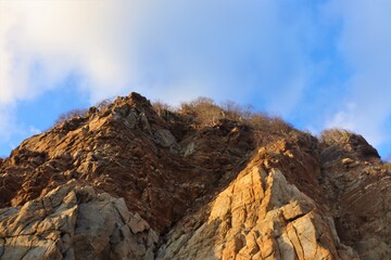 steep cliff with sky
