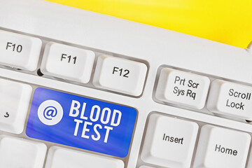 Writing note showing Blood Test. Business concept for Extracted blood sample from an organism to...