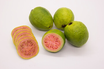 Some Brazilian guavas on white background. Tropical fruit.