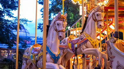 Fototapeta na wymiar Carousel Horses in the Park