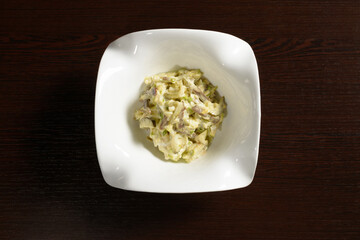 Salad with bacon and pickles top view. Photos for restaurant and cafe menus