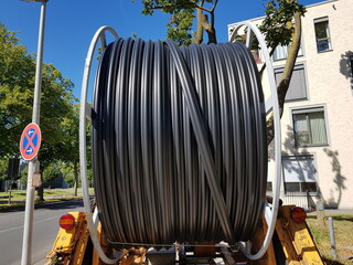 Laying of fiber optic cable in Hanover, Germany.  Glass fibers are employed as fiber optic cable...