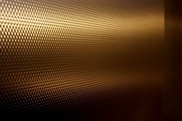 Metallic Gold Textured Shadow and Light Pattern with Surface Sheen at an Angle