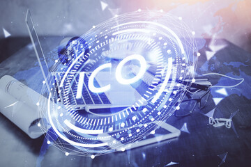 Double exposure of blockchain and crypto economy theme hologram and table with computer background....