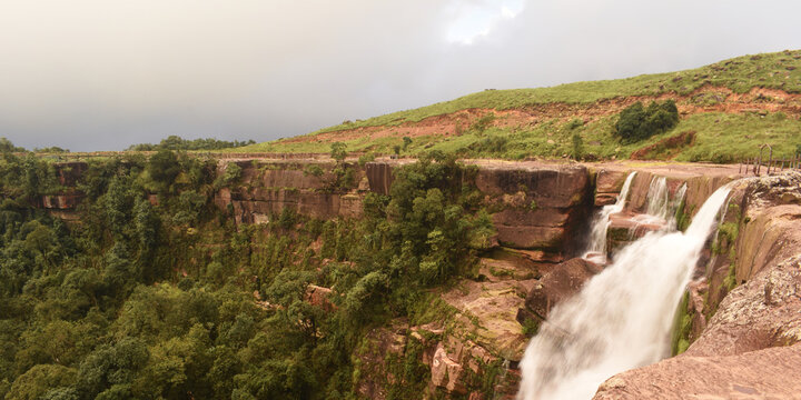 Dainthlen Falls And A Large Green Valley On The Mountain of Sohra or Cherrapunji In Meghalaya In India