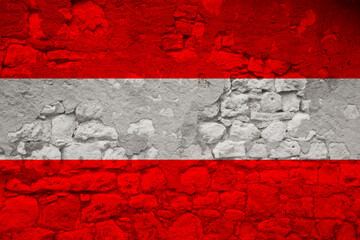 national flag of the state of Austria on an old stone wall with cracks, the concept of historical, tourism, emigration, economy, politics, global world trade