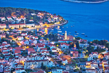 Amazing town of Hvar waterfront aerial evening view