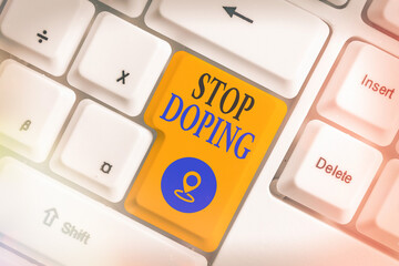 Conceptual hand writing showing Stop Doping. Concept meaning quit the use of banned athletic...