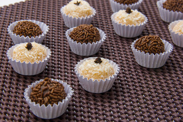 Traditional Brazilian sweet, brigadeiro and beijinho.