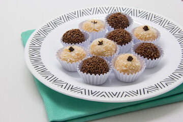 Traditional Brazilian sweet, brigadeiro and beijinho.