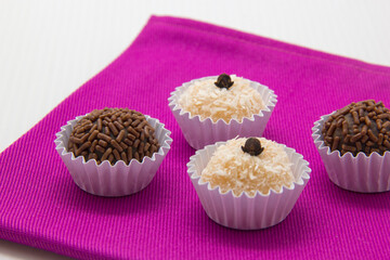 Traditional Brazilian sweet, brigadeiro and beijinho.