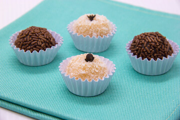 Traditional Brazilian sweet, brigadeiro and beijinho.