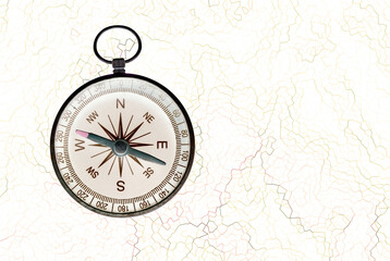 Fototapeta na wymiar round compass on abstract background as symbol of tourism with compass, travel with compass and outdoor activities with compass