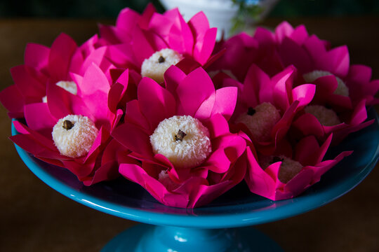 Traditional brazilian sweets - brigadeiros and beijinho.