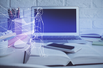 Desktop computer background in office and start up theme hologram drawing. Double exposure. Startup concept.