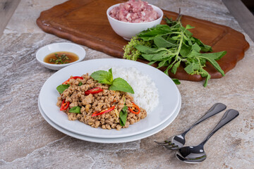 rice topped with stir-fried mince pork and basil , Thai famous Street food