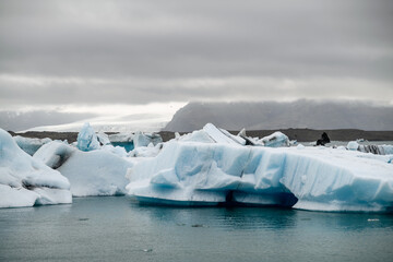 Iceland "Golden circle" journey. Popular place not far from Glacier called "Blue lagoon". Impressive icebergs among the waters of Atlantic ocean. 