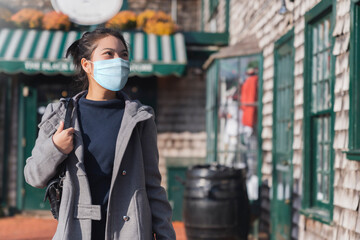 safety travel asian female traveller wear protective mask new normal lifestyle hand use smartphone...