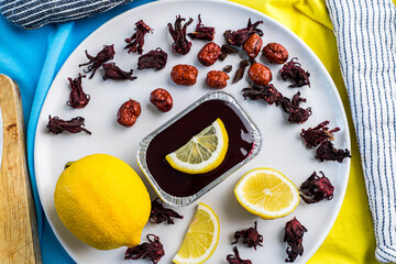 chocolate soft cake with lemon sliced on beatiful dish setting