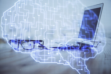 Multi exposure of work table with computer and brain hologram. Brainstorm concept.