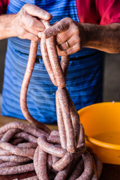 mobile butcher making sausages