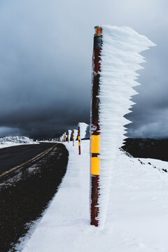 warning markings with windswept horizontal icicles