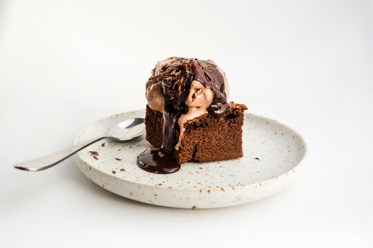 Chocolate Brownie with ice cream and chocolate sauce.