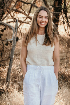 Young woman smiling.