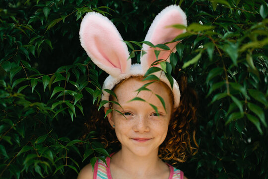 Girl in bunny ears