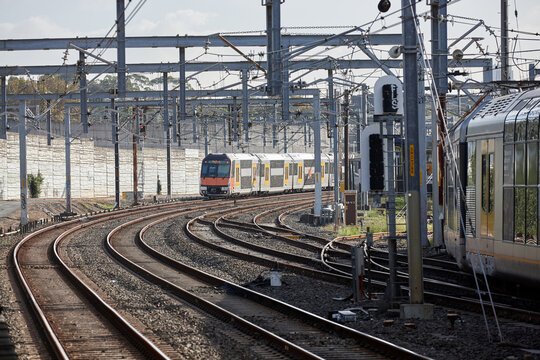 Trains on network of railway tracks - Powered by Adobe