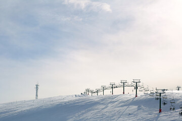 Chairlift on ski slopes