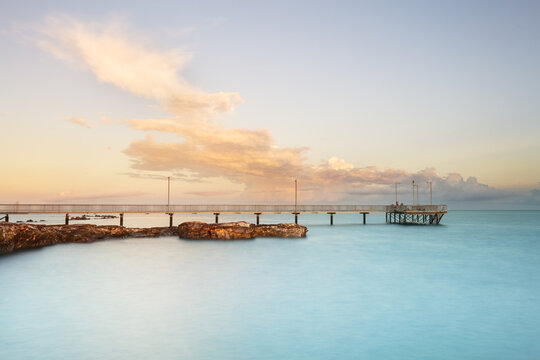 Nightcliff Jetty in morning light, pier with clouds in Darwin