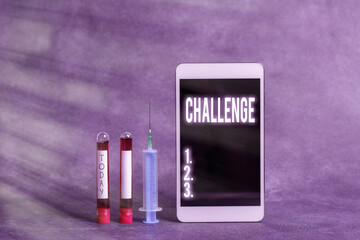 Text sign showing Challenge. Business photo showcasing process of provoking or testing physiological activity by exposure Extracted blood sample vial with medical accessories ready for examination