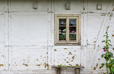 Close up on old cabin wall and window