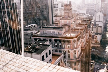 Old pink building in the center of a modern metropolis wide