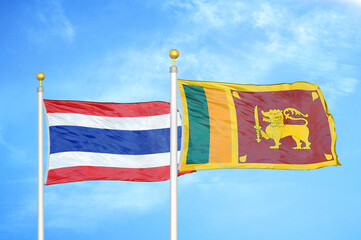 Thailand and Sri Lanka two flags on flagpoles and blue sky