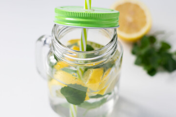 
Drink with lemon, mint and ice. All this on a white background