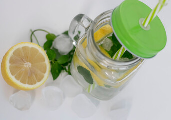 
Drink with lemon, mint and ice. All this on a white background