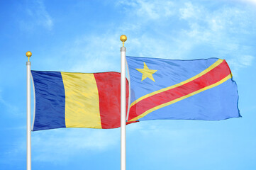 Romania and Congo Democratic Republic two flags on flagpoles and blue sky