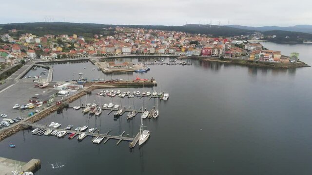 Boats Moored  in coastal village.Spain. Aerial Drone Video