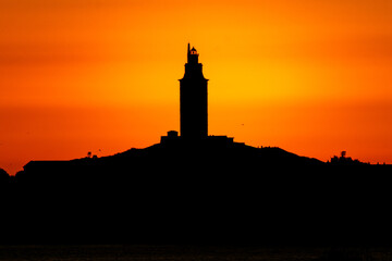 Summer sunset on the Tower of Hércules, UNESCO World Heritage Site, Galicia, Spain