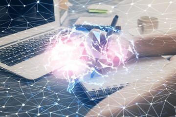 Multi exposure of writing hand on background with brain hologram. Concept of learning.
