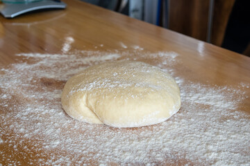fresh dough over wood table