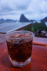 glass of cola with ice