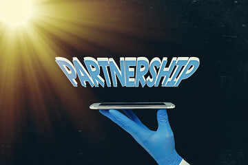 Writing note showing Partnership. Business concept for legal relation between two or more...