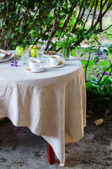 coffee and breakfast on the table outdoor country terrace
food background top view copy space for text organic healthy eating