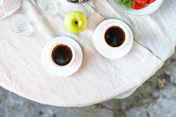 coffee and breakfast on the table outdoor country terrace
food background top view copy space for text organic healthy eating